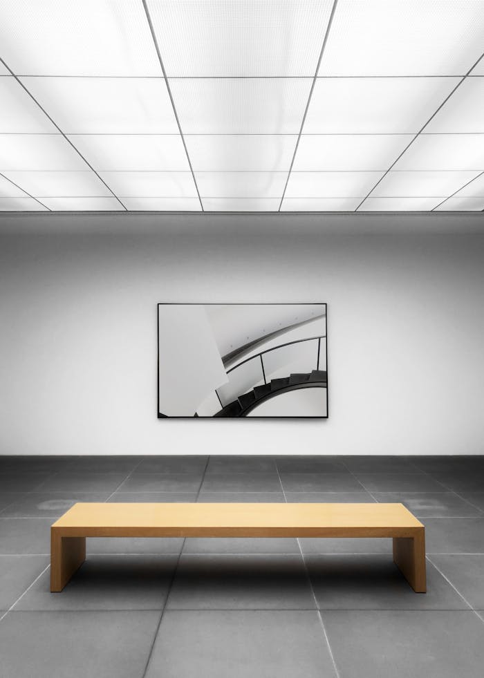 hero-img-01 Minimalist art gallery in Nuremberg showcasing modern artwork with sleek design and spacious layout.